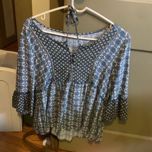 Prettt multi designed top with beads on the end of drawstrings